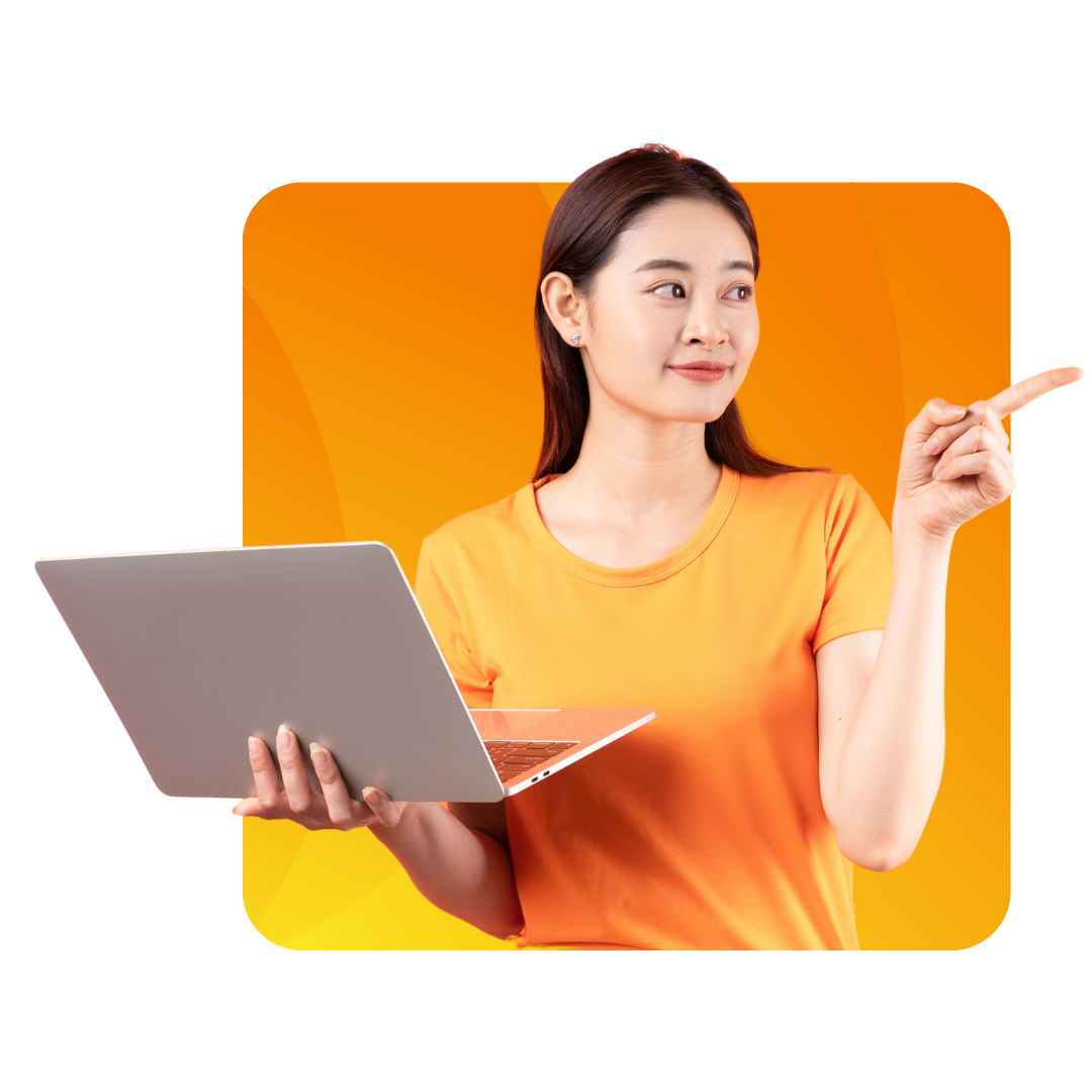 A woman in an orange shirt holds a laptop in one hand and points to the right with the other, standing in front of an orange gradient background.