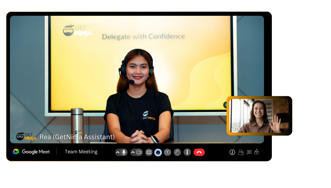 A woman wearing a headset sits at a desk during a virtual meeting, with a screen behind her displaying Delegate with Confidence. Another woman waves from a smaller video window on the screen. Google Meet interface is visible.